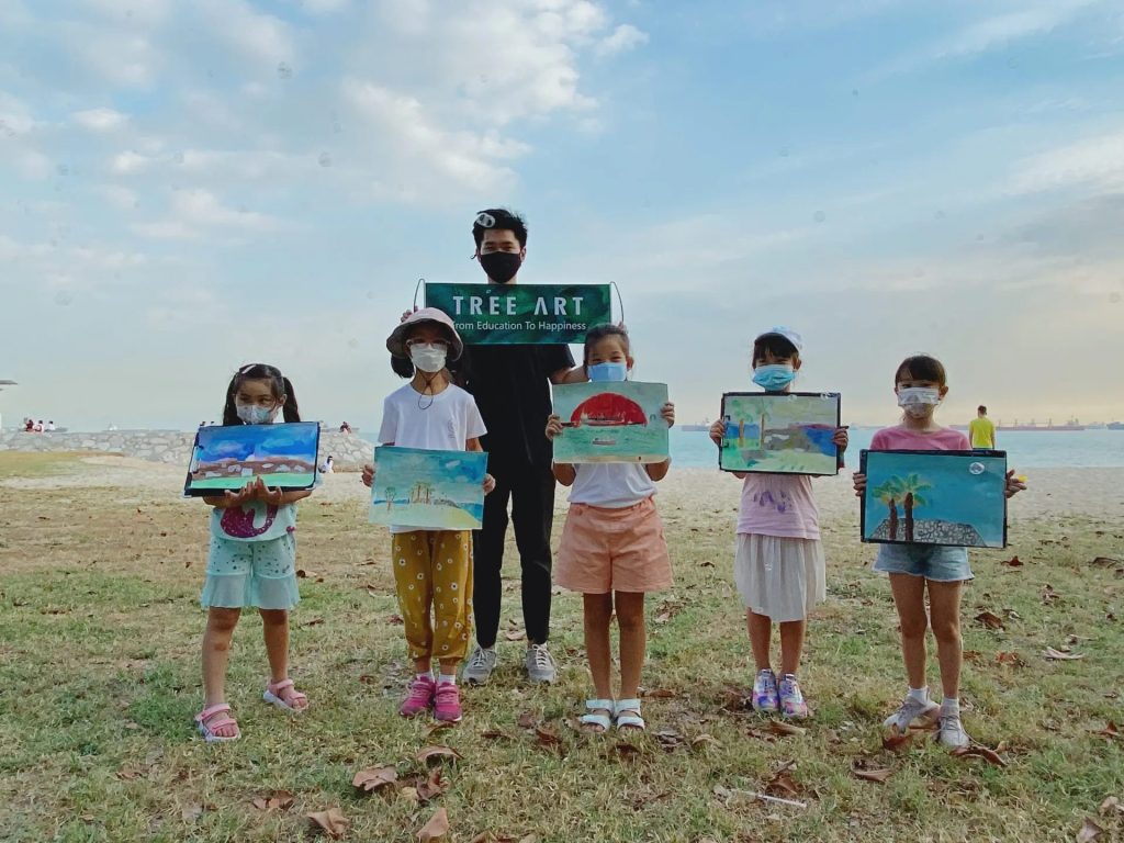 Children in a group art class setting, representing what to look for when choosing the right class for a child