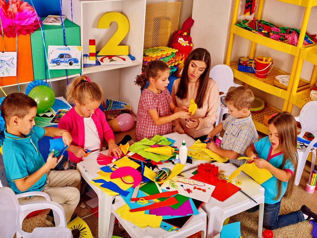 Children enjoying a fun, interactive art class activity together