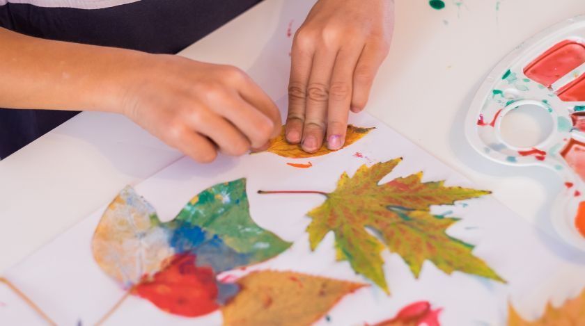 Child absorbed in an art activity, illustrating a growing passion for creative pursuits