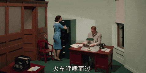 Film still from Shirley: Visions of Reality showcasing its theatrical use of light and color