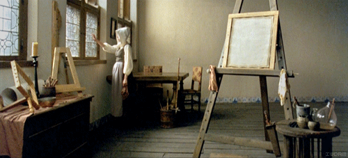 Film still from Girl with a Pearl Earring showing the movie's period cinematography and lighting