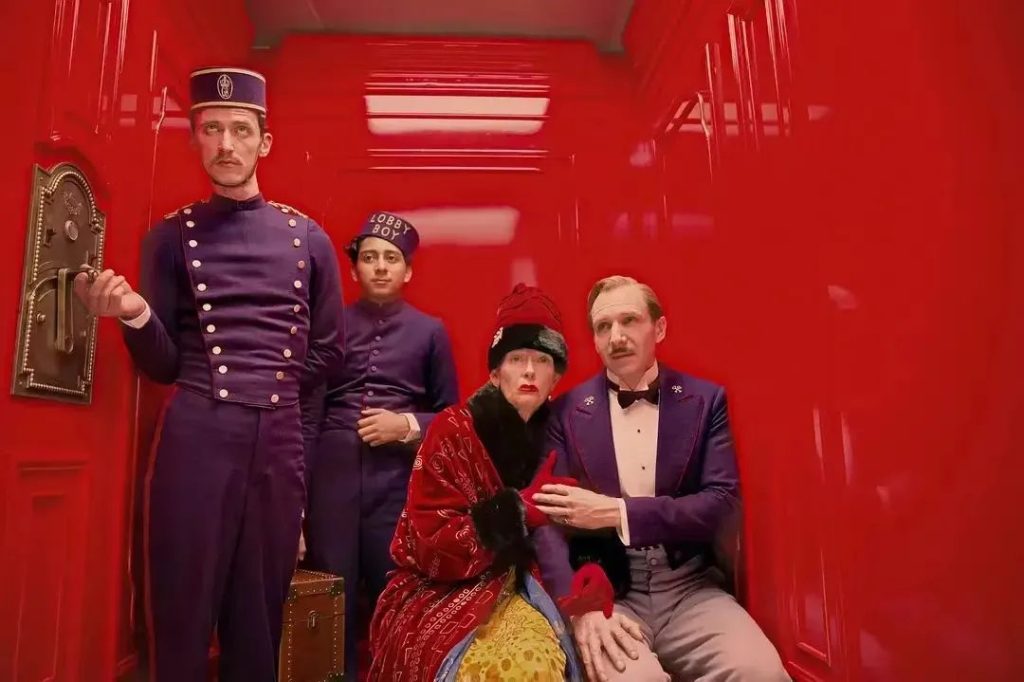 Still from The Grand Budapest Hotel hinting at the story's more bittersweet, tragic undertones