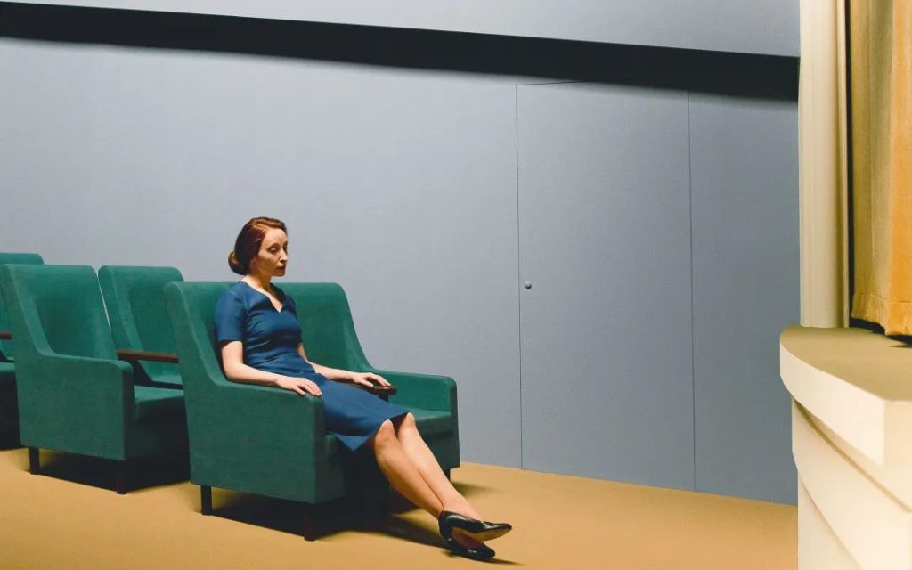 Film still from Shirley: Visions of Reality depicting quiet middle-class interior life in Edward Hopper's style