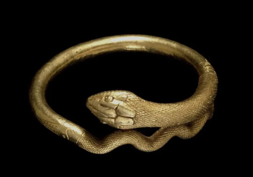 Ancient Greek artwork or artifact depicting a serpent motif, such as the Ouroboros or the Rod of Asclepius