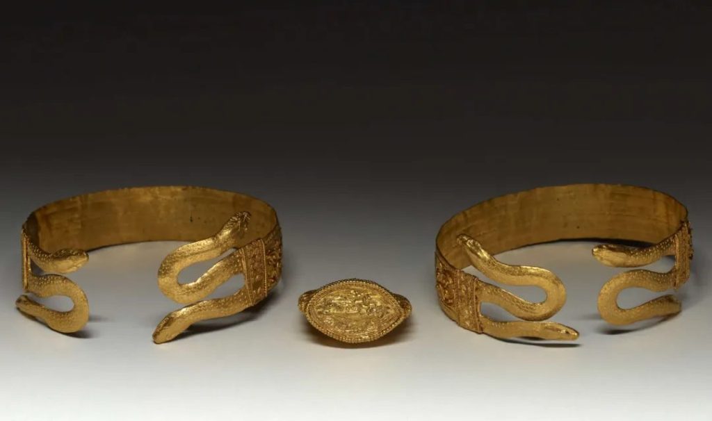 Additional artwork depicting the serpent from the biblical story of Adam and Eve