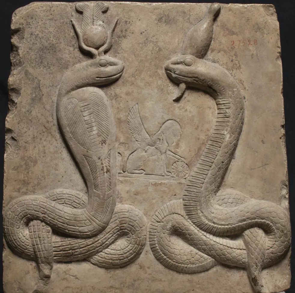 Ancient Egyptian artifact featuring a cobra motif, associated with protection and royal authority