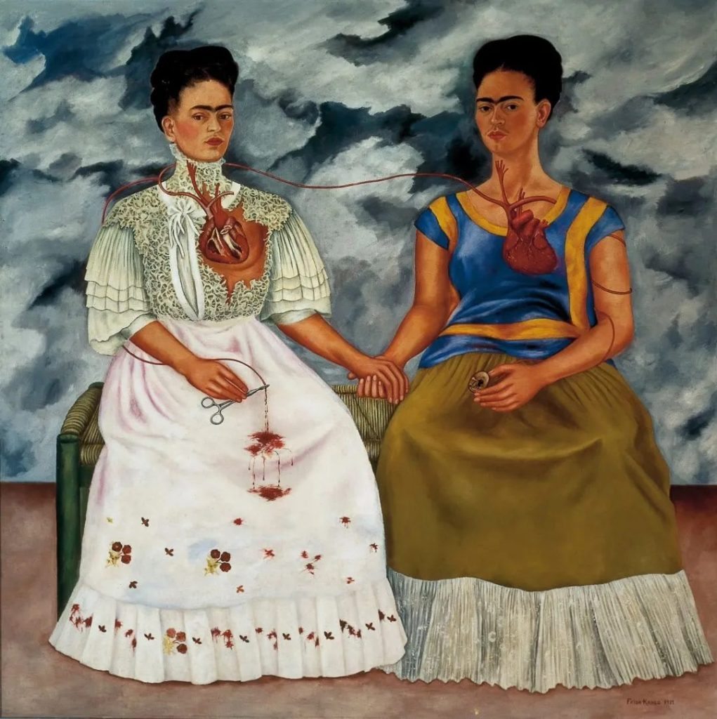 Frida Kahlo's The Two Fridas, painted in dominant tones of red and white