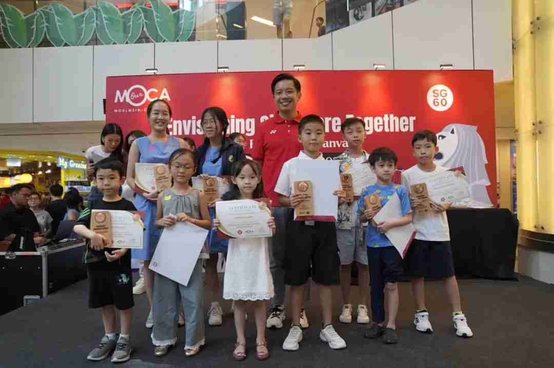 A winner receiving their certificate at the Our Future Canvas awards ceremony