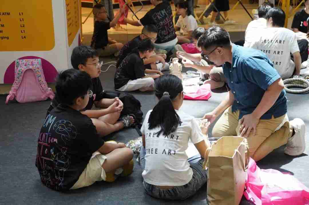 Photo of a master mentor interacting with young winners