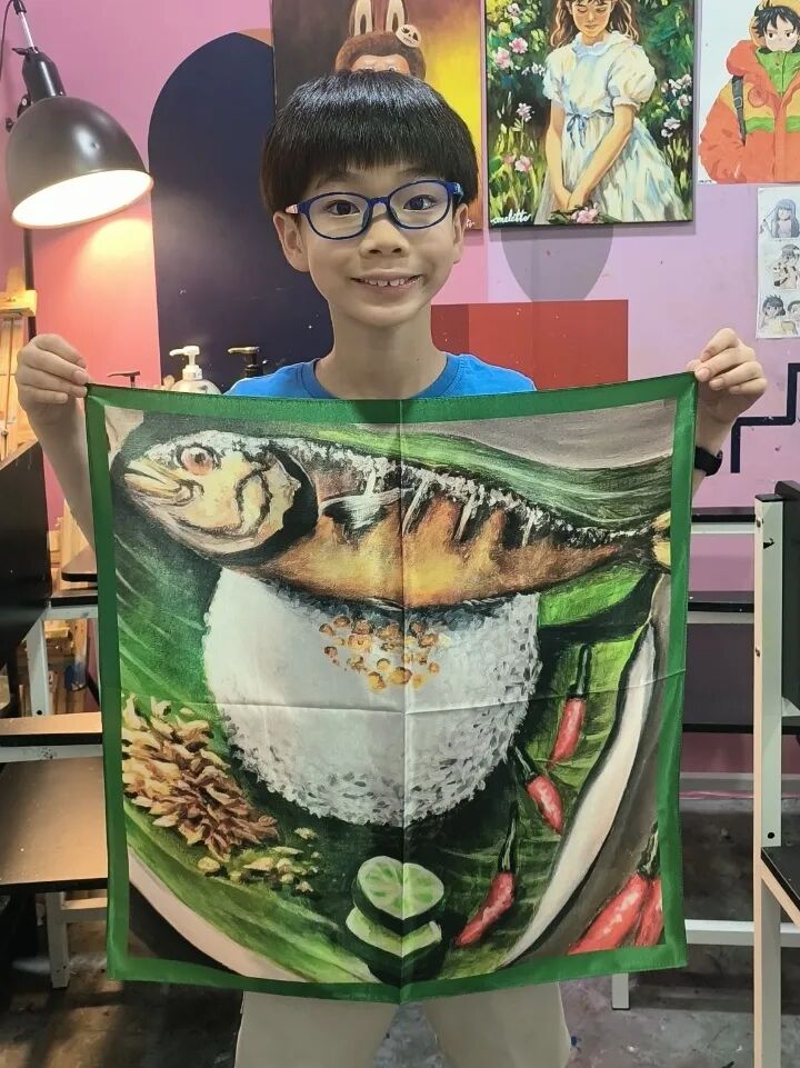 Detail of a child's silk scarf pattern displayed as art