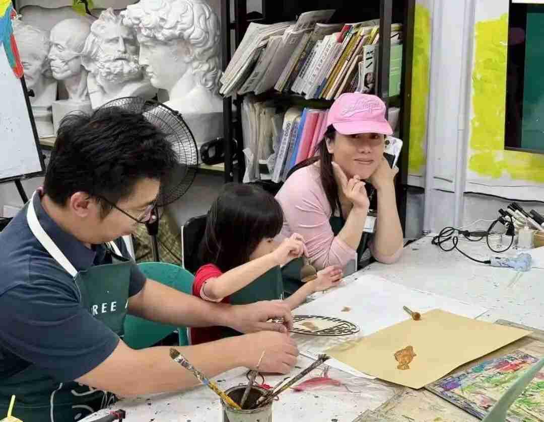 A TreeArt student working on their artwork in class