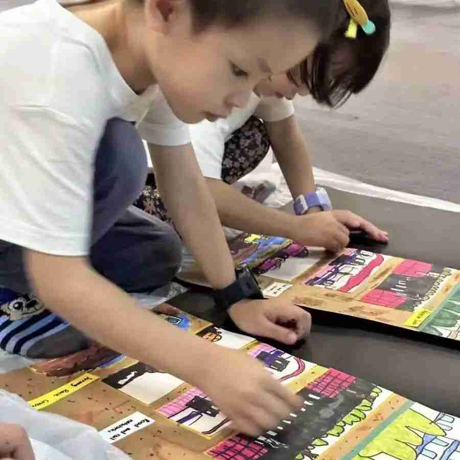 Child working on a painting or drawing project at Tree Art