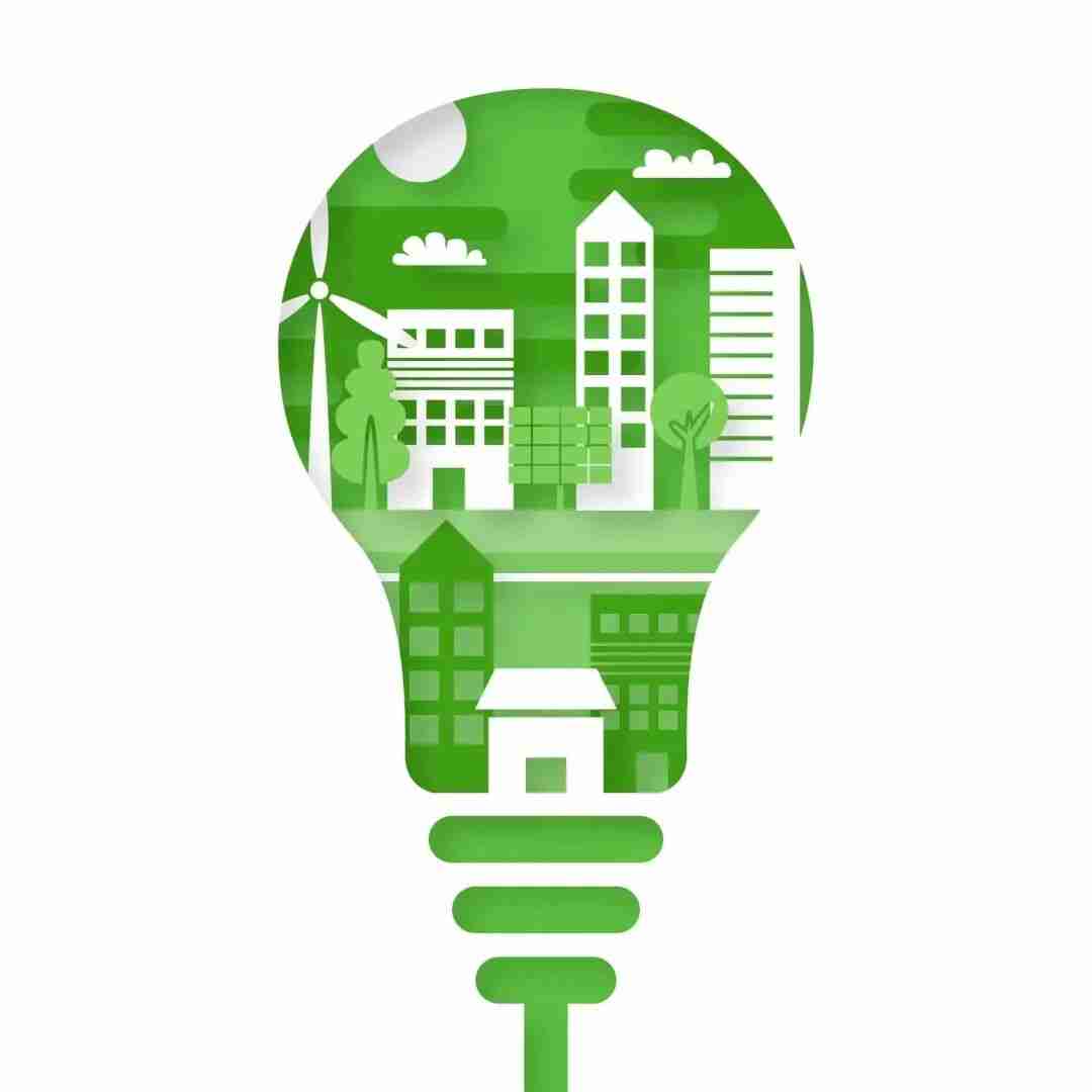 Illustration of a lightbulb containing a green sustainable city with solar panels, wind turbines, and trees, symbolizing innovative ideas for sustainability