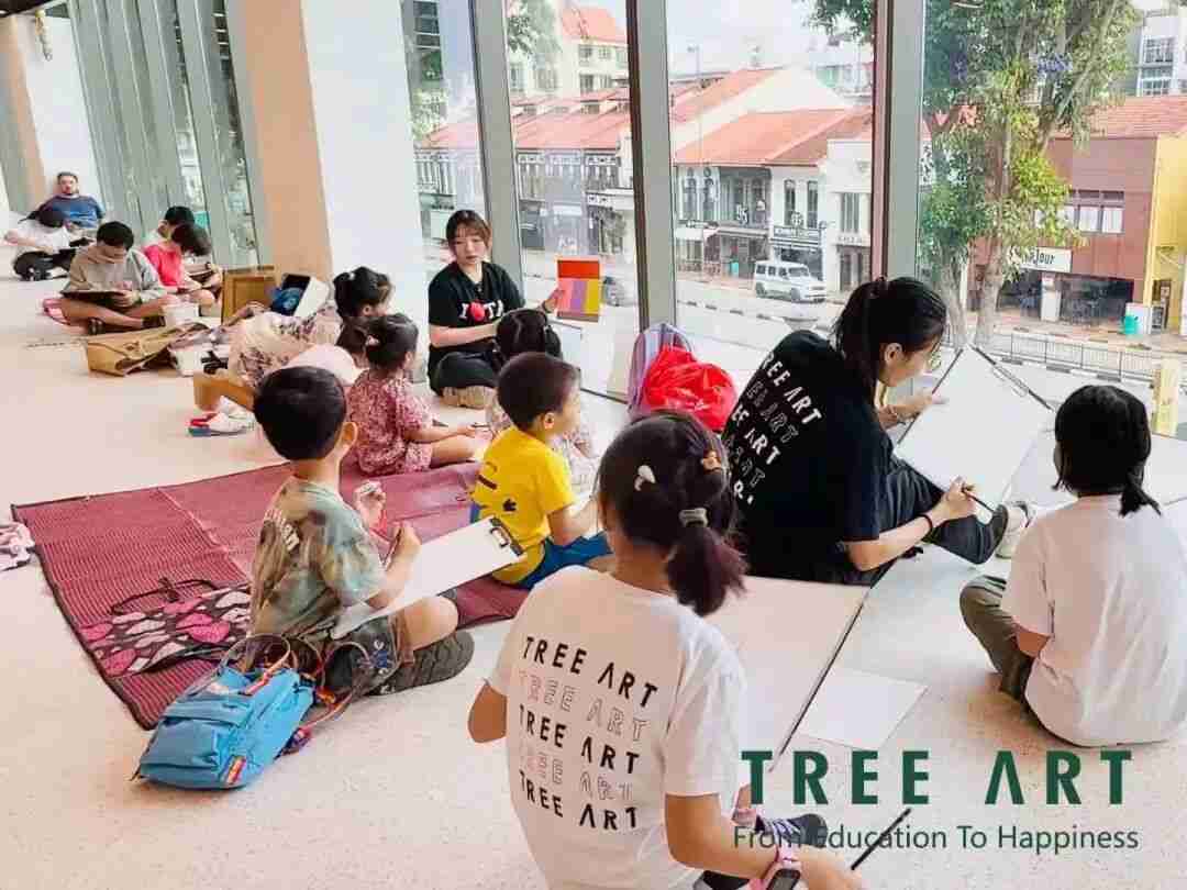 A young artist absorbed in creating an expressive painting during a TreeArt class