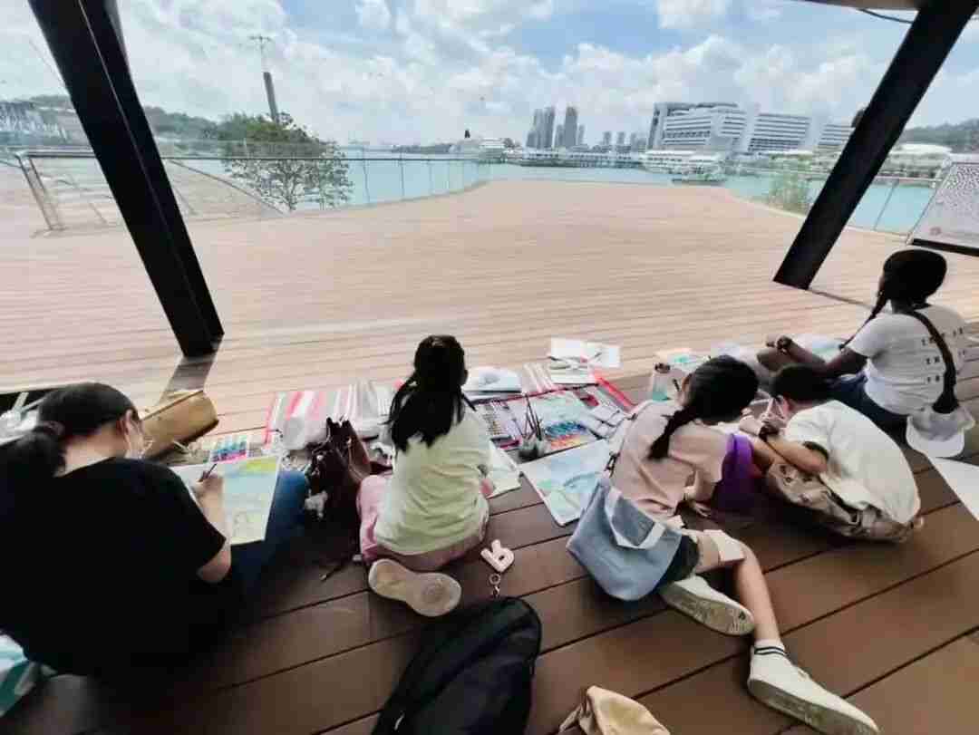 A child capturing the lines and light of a scouted Singapore location