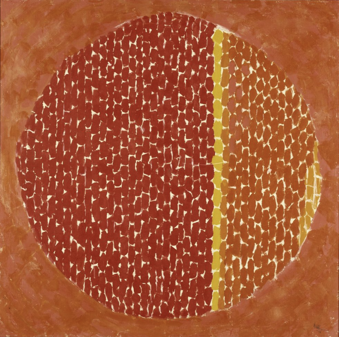 Alma Thomas painting of a large circle divided into red and orange mosaic-like bands with a yellow stripe, set against a warm orange background