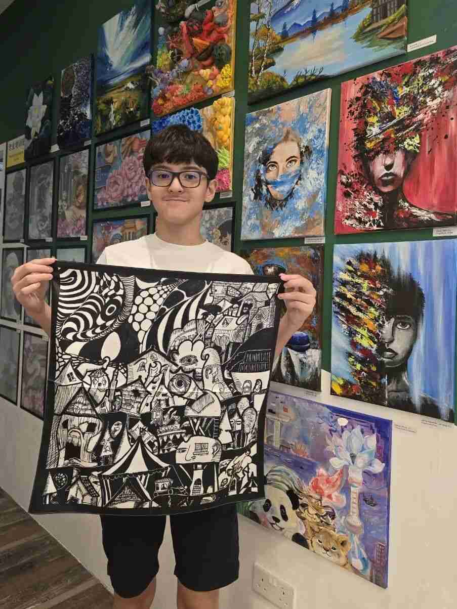 Young artist engaged in the joy of creating at TREE ART