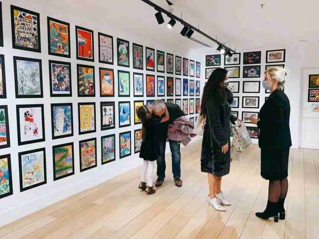 Photo of children immersed in a creative art-learning environment