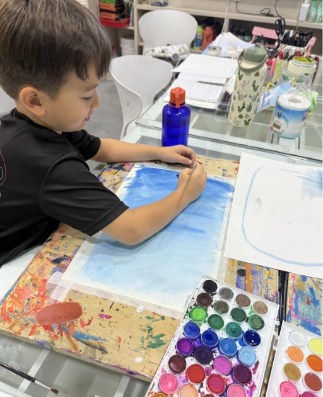 A child's drawing with a dark, suppressed patch of color expressing a strong emotion