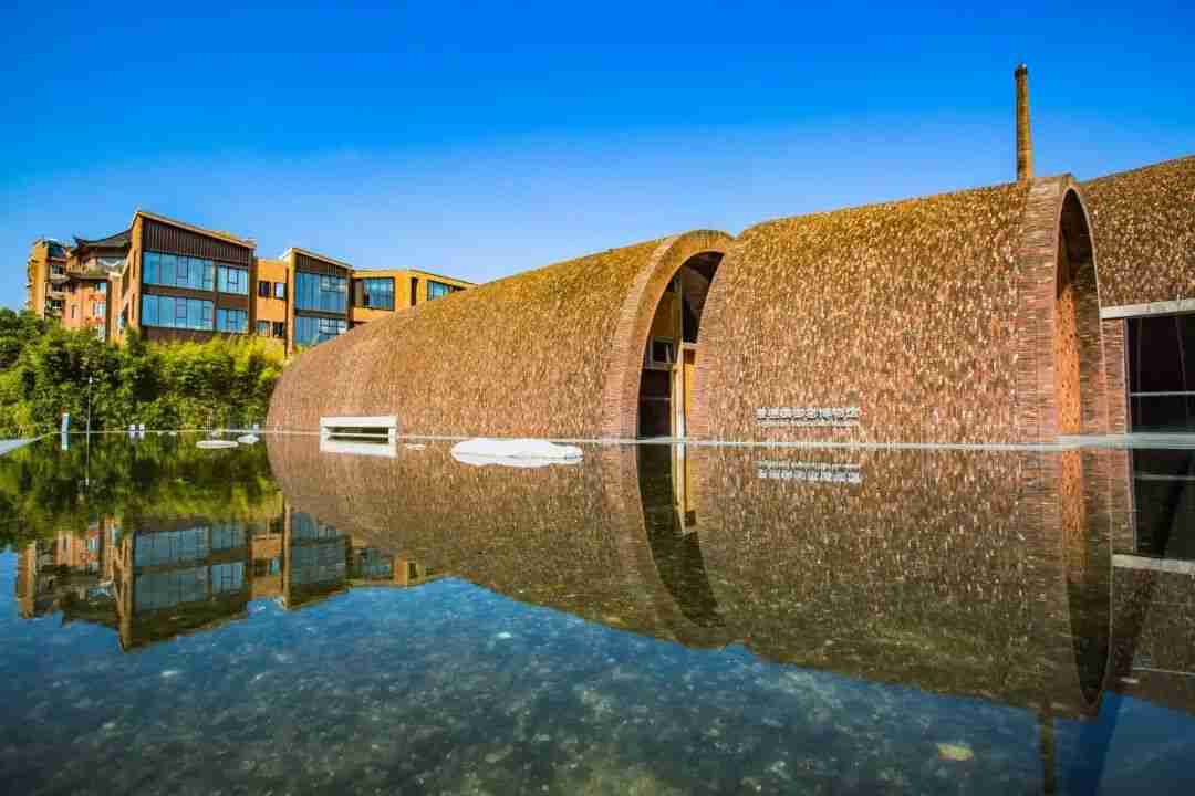 Red-brick arches and sunken courtyard architecture of the Imperial Kiln Museum