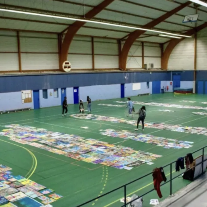 Jury members continuing their review of the competition's submitted artworks