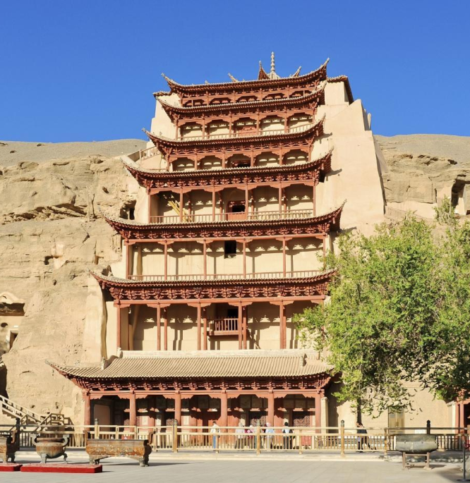 The nine-storey pavilion at the entrance to the Mogao Caves under a blue sky