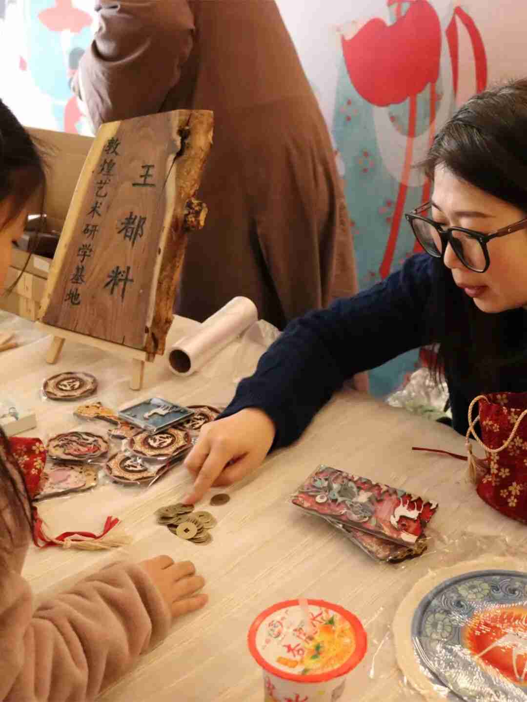 Children bargaining for treats at the study tour bazaar