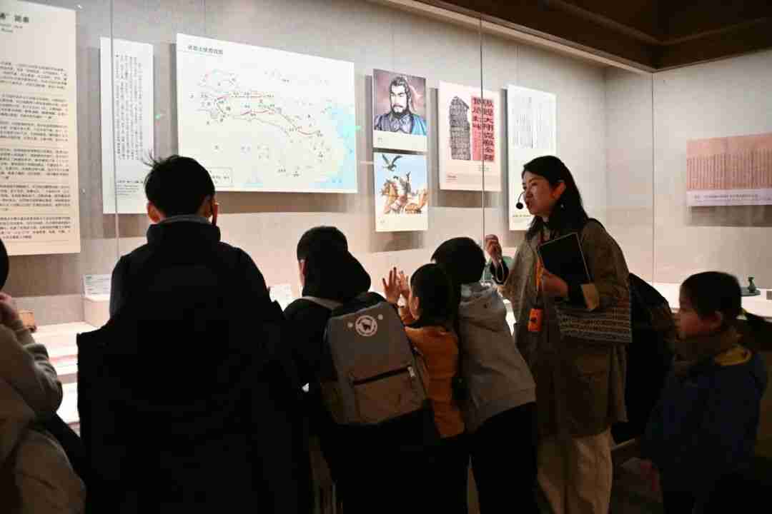 Children exploring exhibits at the Dunhuang Museum