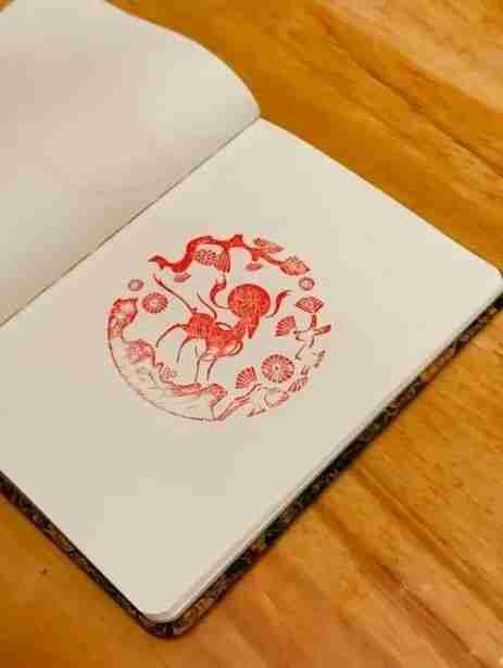 Rows of decorative stamps inside the Dunhuang Seal House