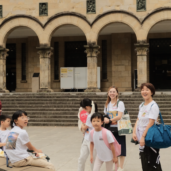 Children walking along the tree-lined paths of the University of Tokyo campus
