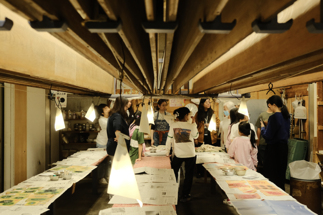 Children arriving at a traditional Kyoto craft workshop
