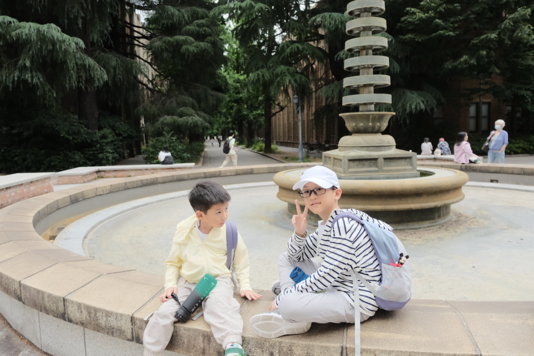 A child sketching the University of Tokyo's century-old buildings