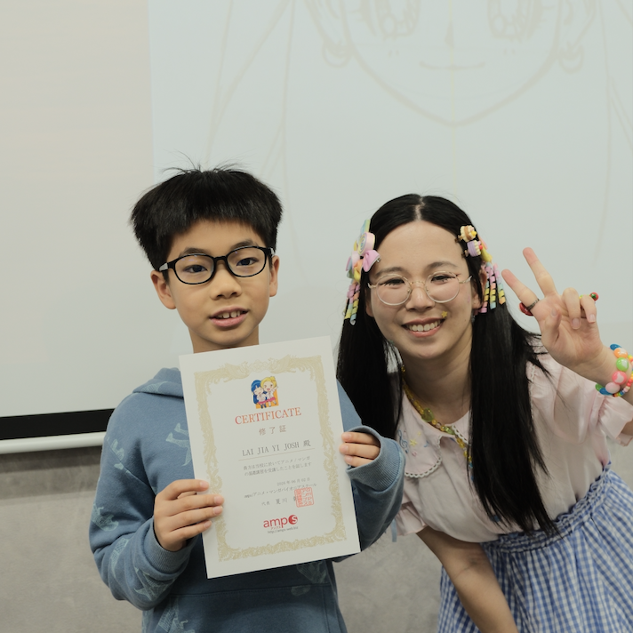 Children displaying their AMPS Anime School completion certificates