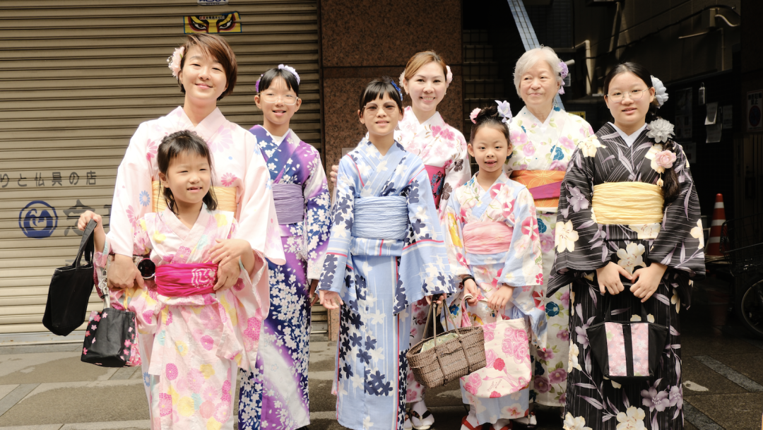 Parents and children dressed in traditional kimonos at Senso-ji temple