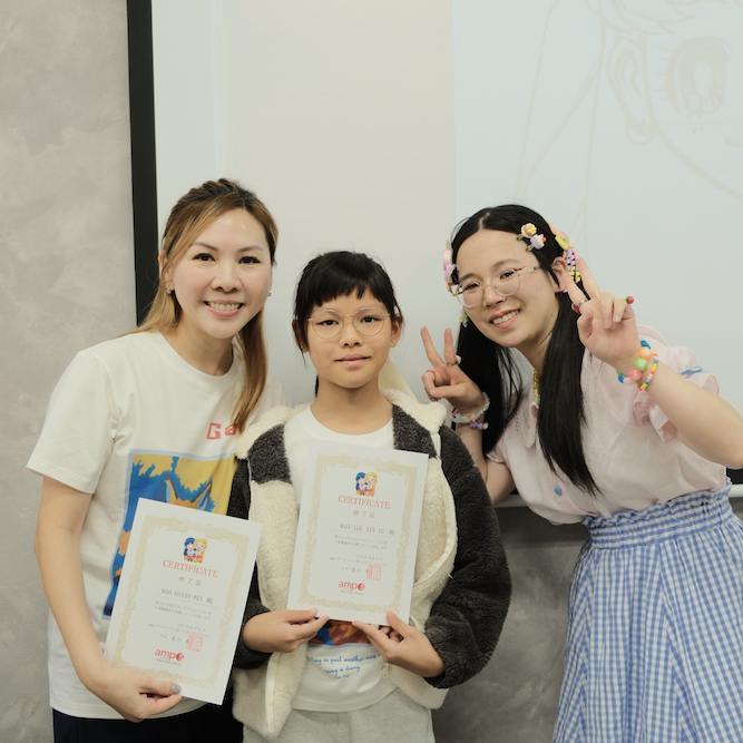 Group photo of the children with their anime instructors at AMPS Anime School