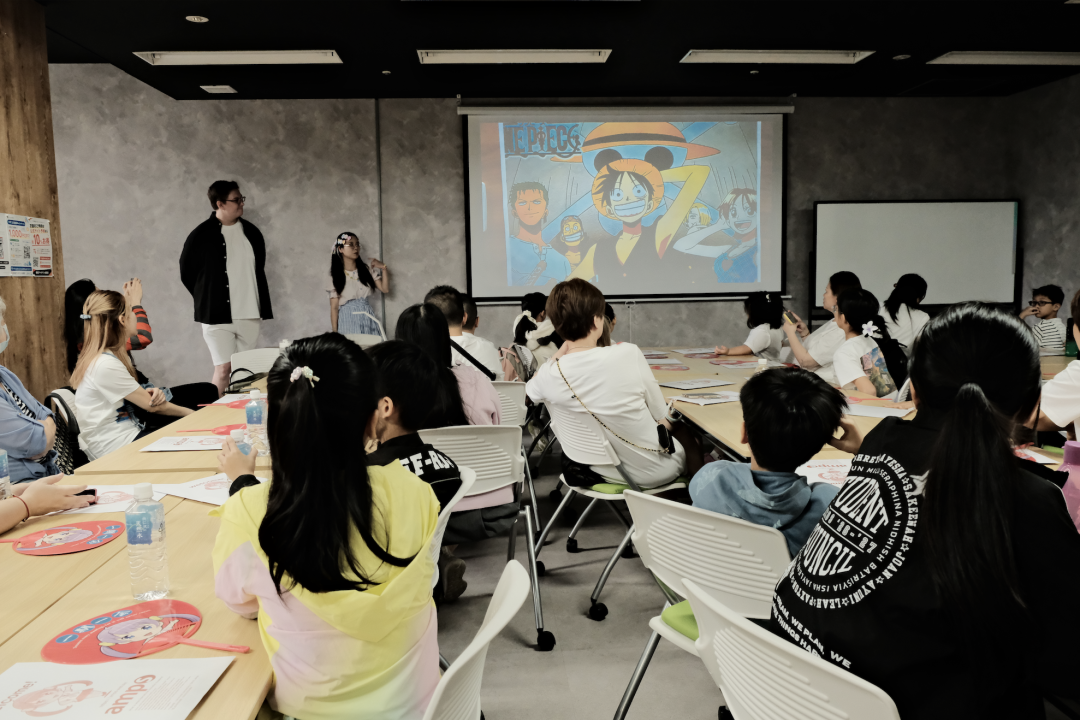 Children at AMPS Anime School in Tokyo with their Japanese anime instructors