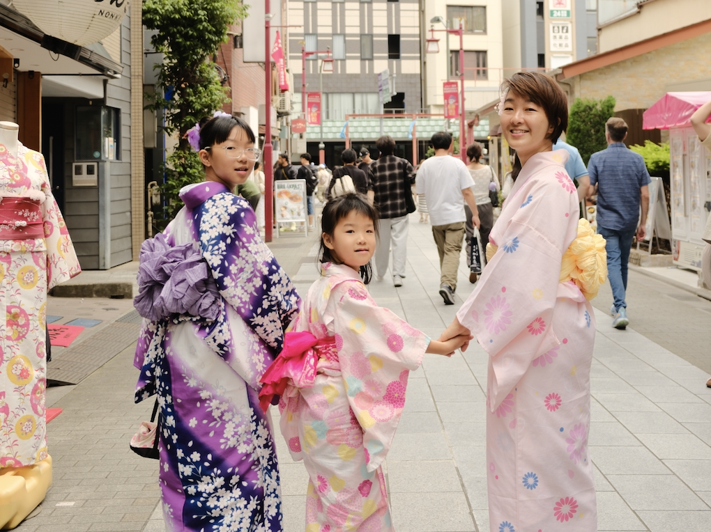 Children smiling together during the Japan study tour